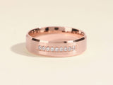 Rose gold ring with channel-set diamonds, brushed finish, jewelry