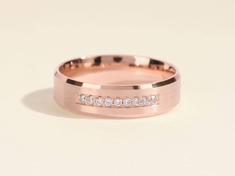 Rose gold ring with channel-set diamonds, brushed finish, jewelry