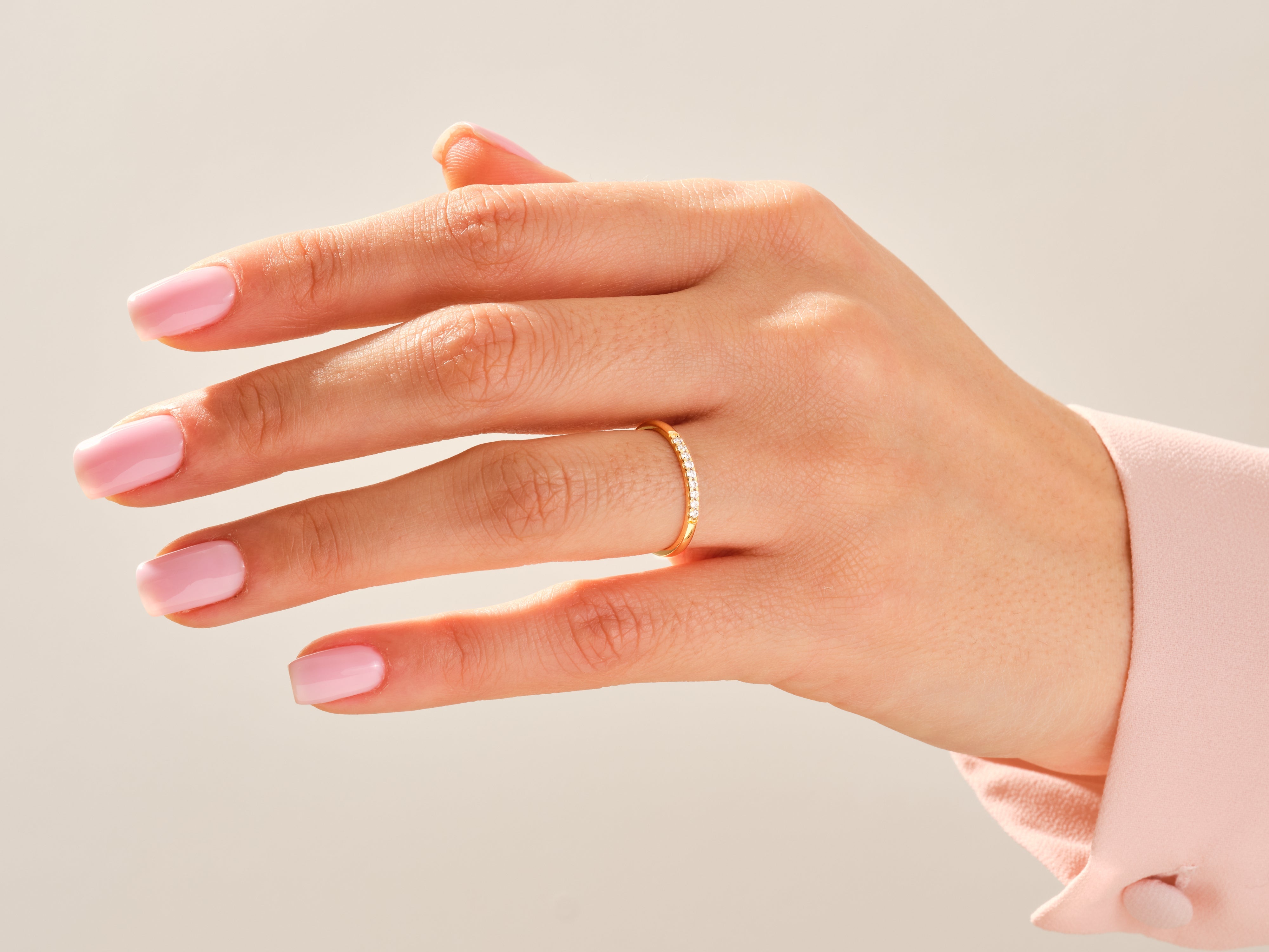 Diamond band ring on a woman's hand, elegant jewelry for sale