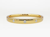 Gold band ring with scattered diamonds, fine jewelry