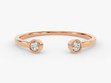 Rose gold bypass ring with two diamonds