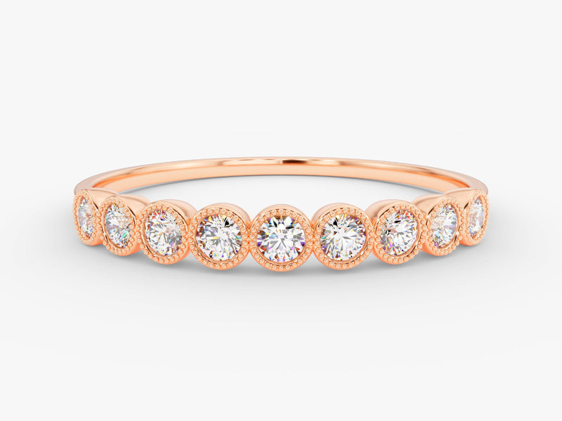 Rose gold diamond band ring with bezel-set stones