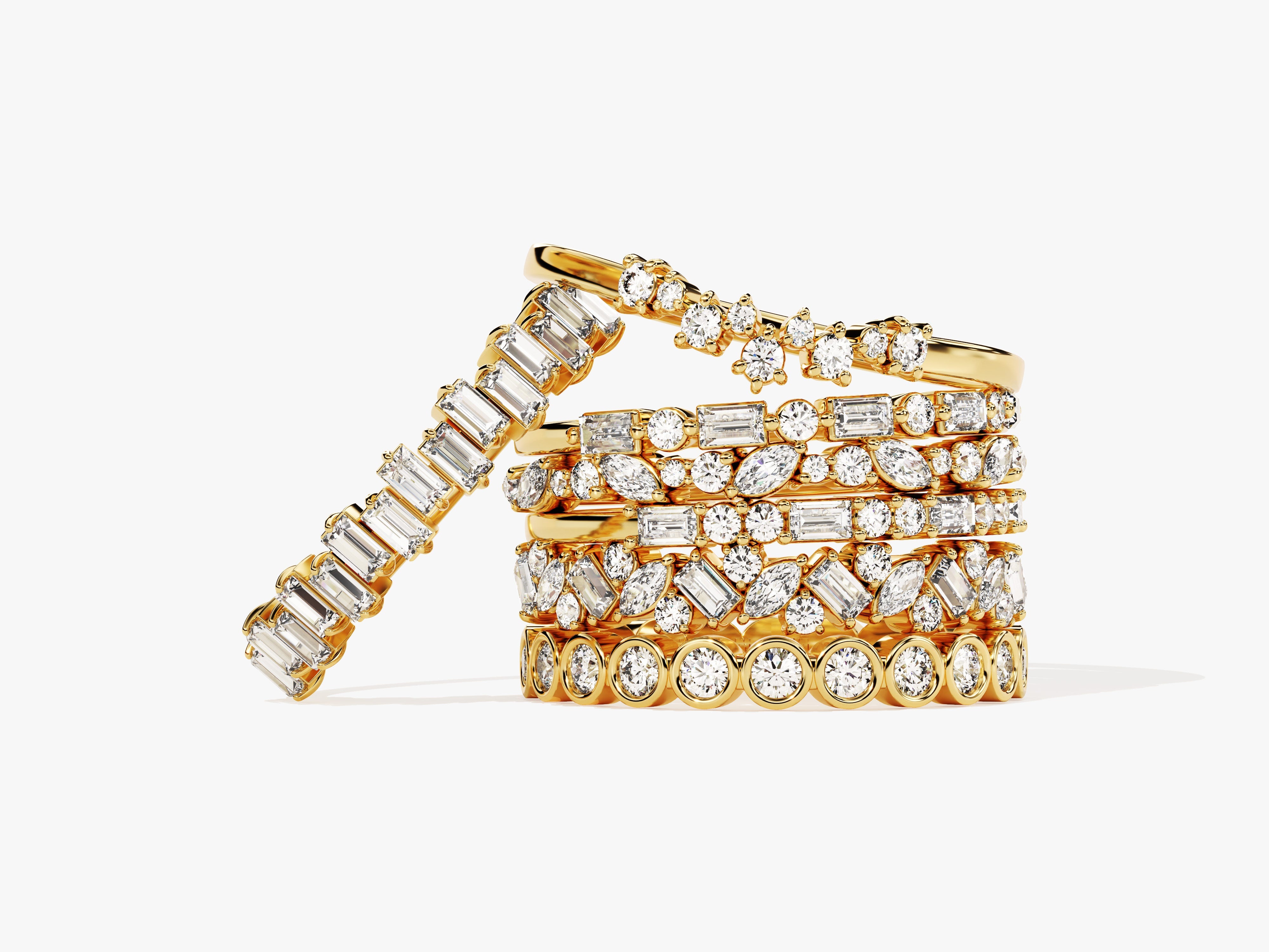 Stack of gold diamond rings, fine jewelry collection