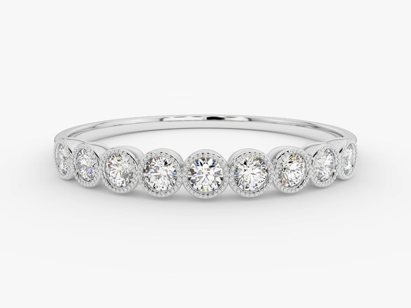 Diamond eternity ring with bezel-set oval diamonds