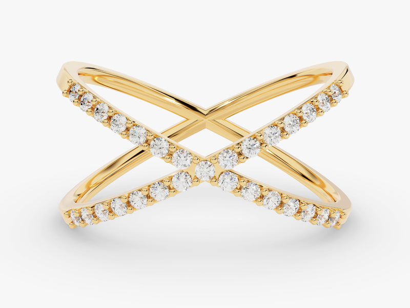 Gold criss-cross ring with diamonds, elegant jewelry design