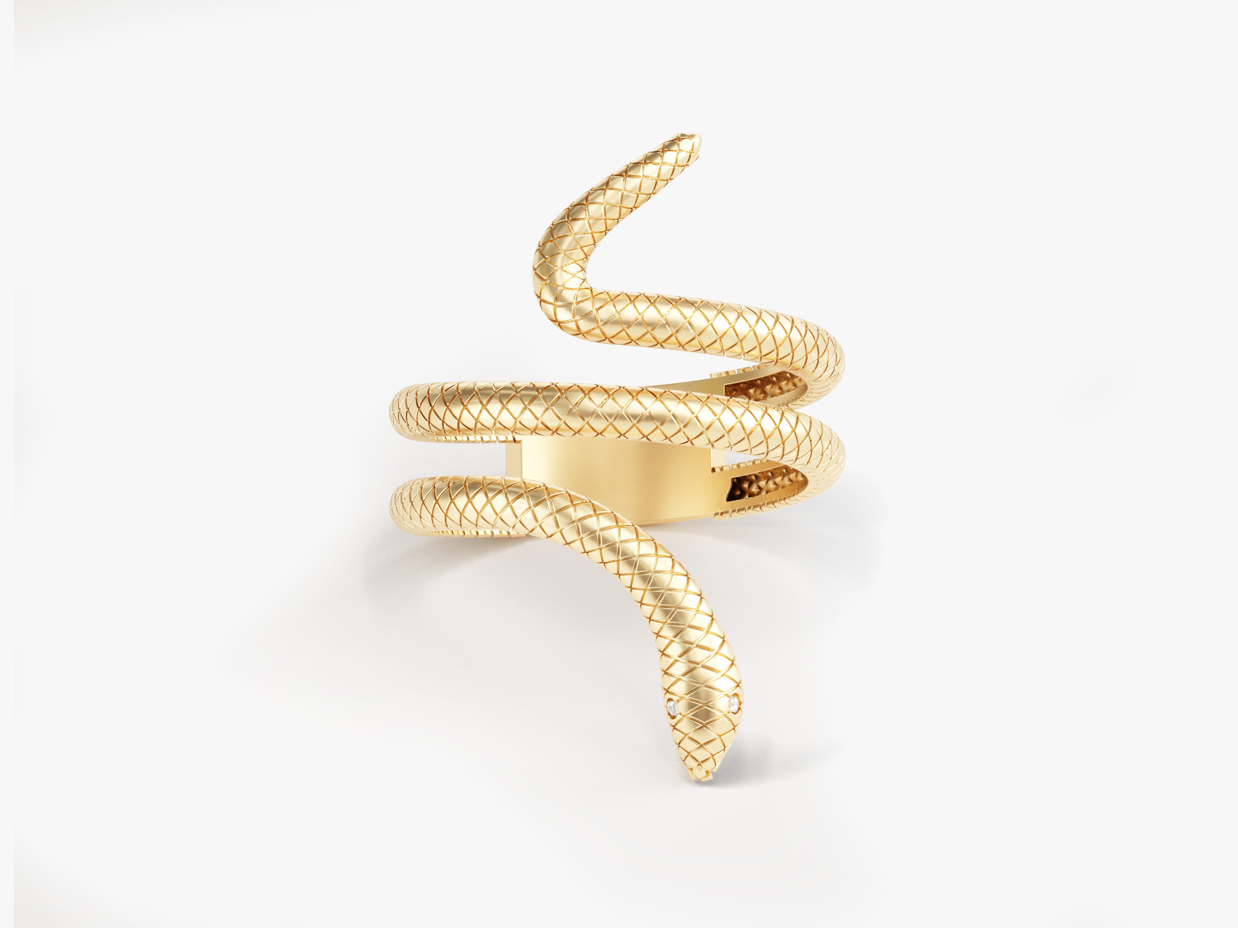 Gold snake ring with diamond eyes, luxury jewelry