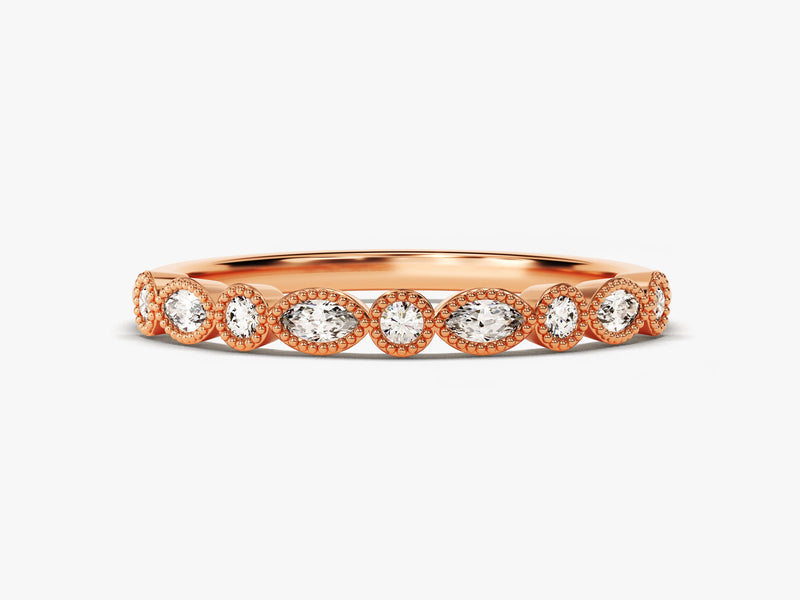 Rose gold diamond band ring with oval and round cut stones