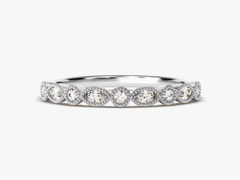 Diamond eternity ring with oval and round cut stones