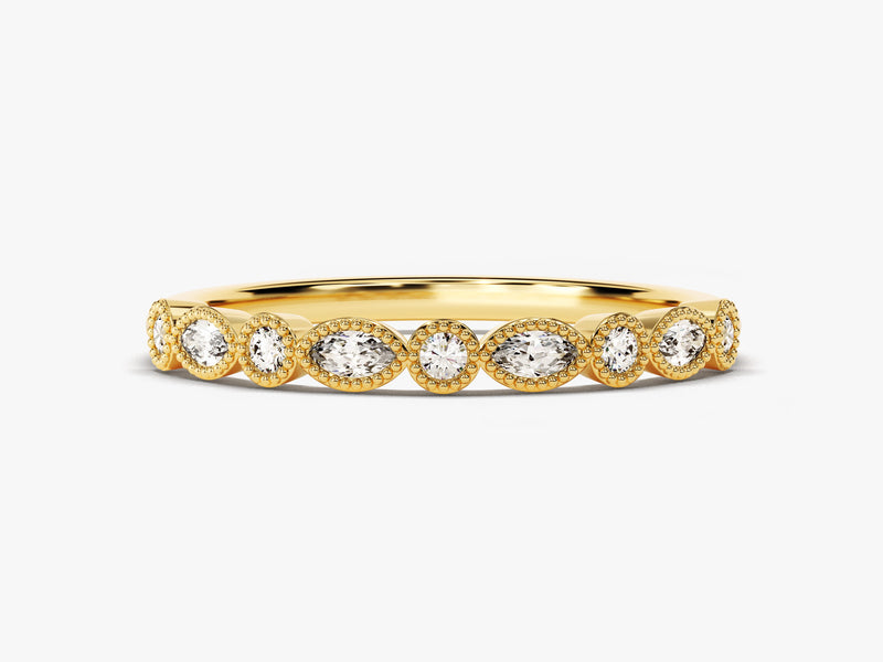 Gold ring with alternating round and marquise diamonds, beaded setting