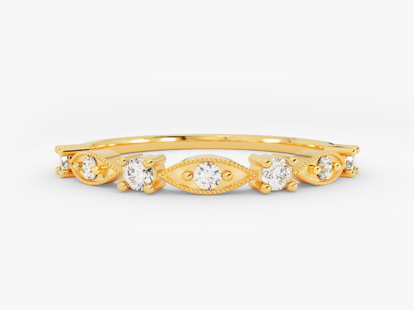 Gold diamond ring with intricate detailing and sparkling stones