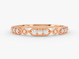 Rose gold diamond ring with geometric pattern and beaded details