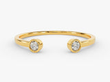 Gold bypass ring with two diamonds, fine jewelry