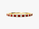 Gold eternity band with alternating rubies and diamonds