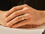 Men's textured gold ring on hand, fine jewelry