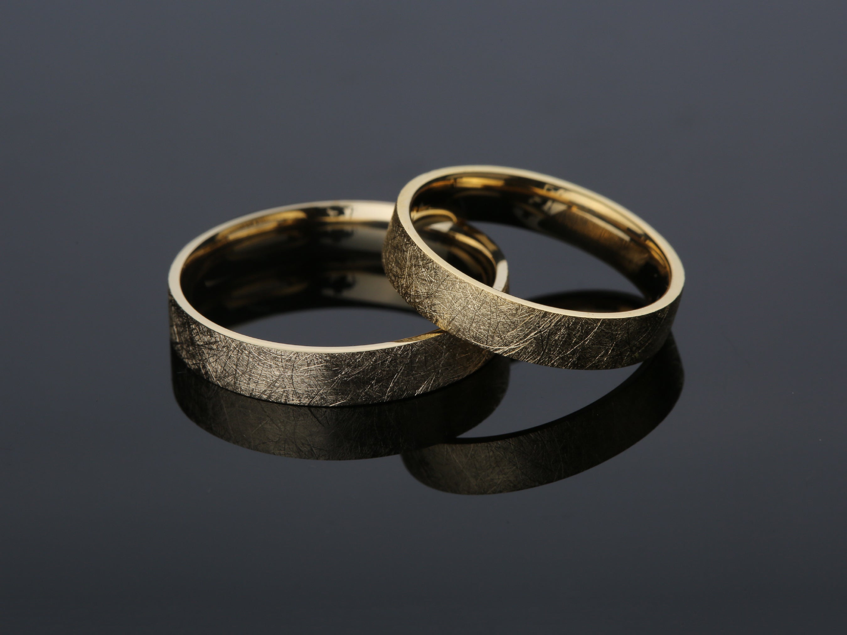 Textured gold wedding bands from jewelry company