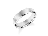 Brushed silver wedding band with polished edges, jewelry