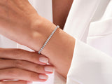 Diamond tennis bracelet on a woman's wrist, elegant jewelry