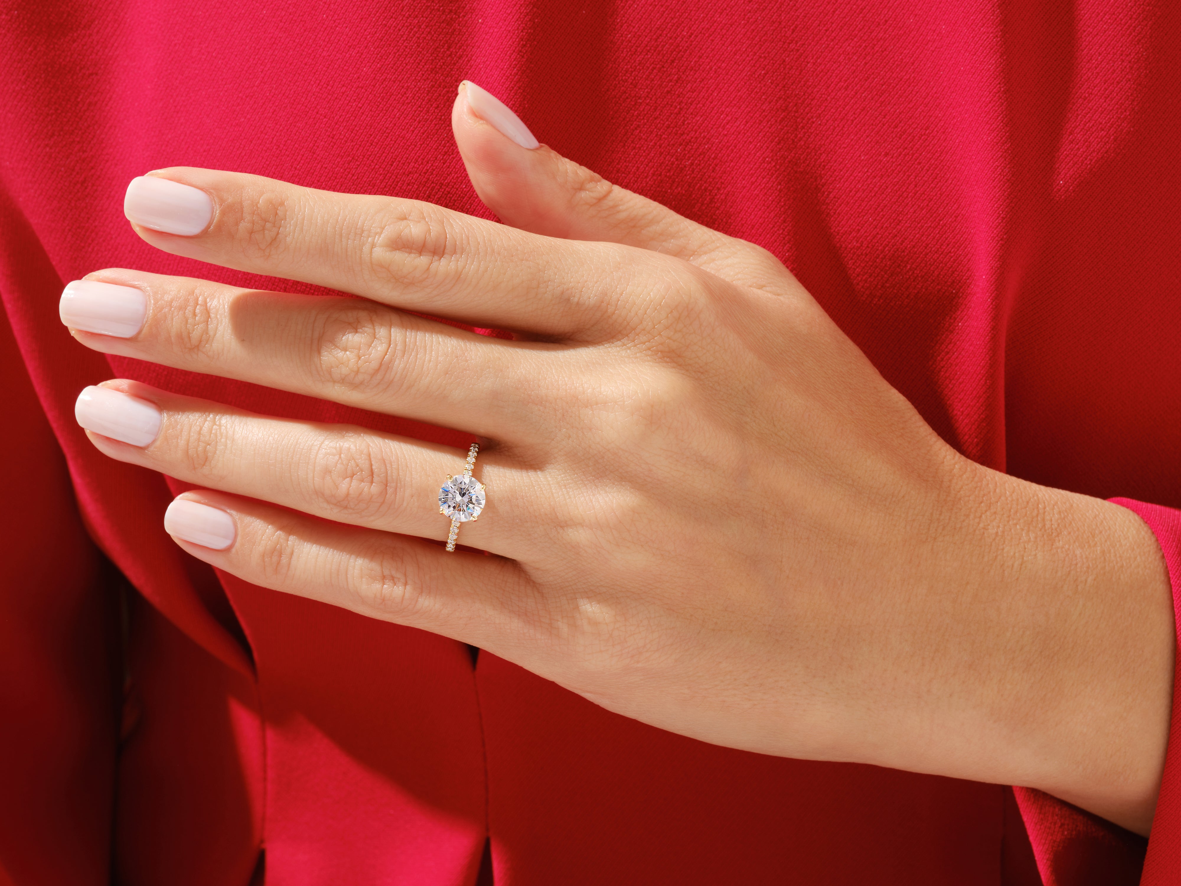 Diamond engagement ring on hand, luxury jewelry for women