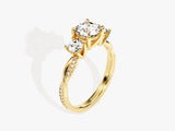Gold diamond engagement ring with twisted band and pave diamonds