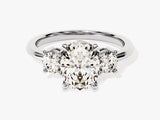 Oval diamond engagement ring with side stones