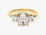 Gold three-stone diamond engagement ring for jewelry company
