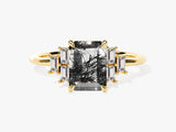 Gold ring with emerald-cut rutilated quartz and baguette diamonds