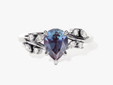 Pear-shaped alexandrite engagement ring with diamonds
