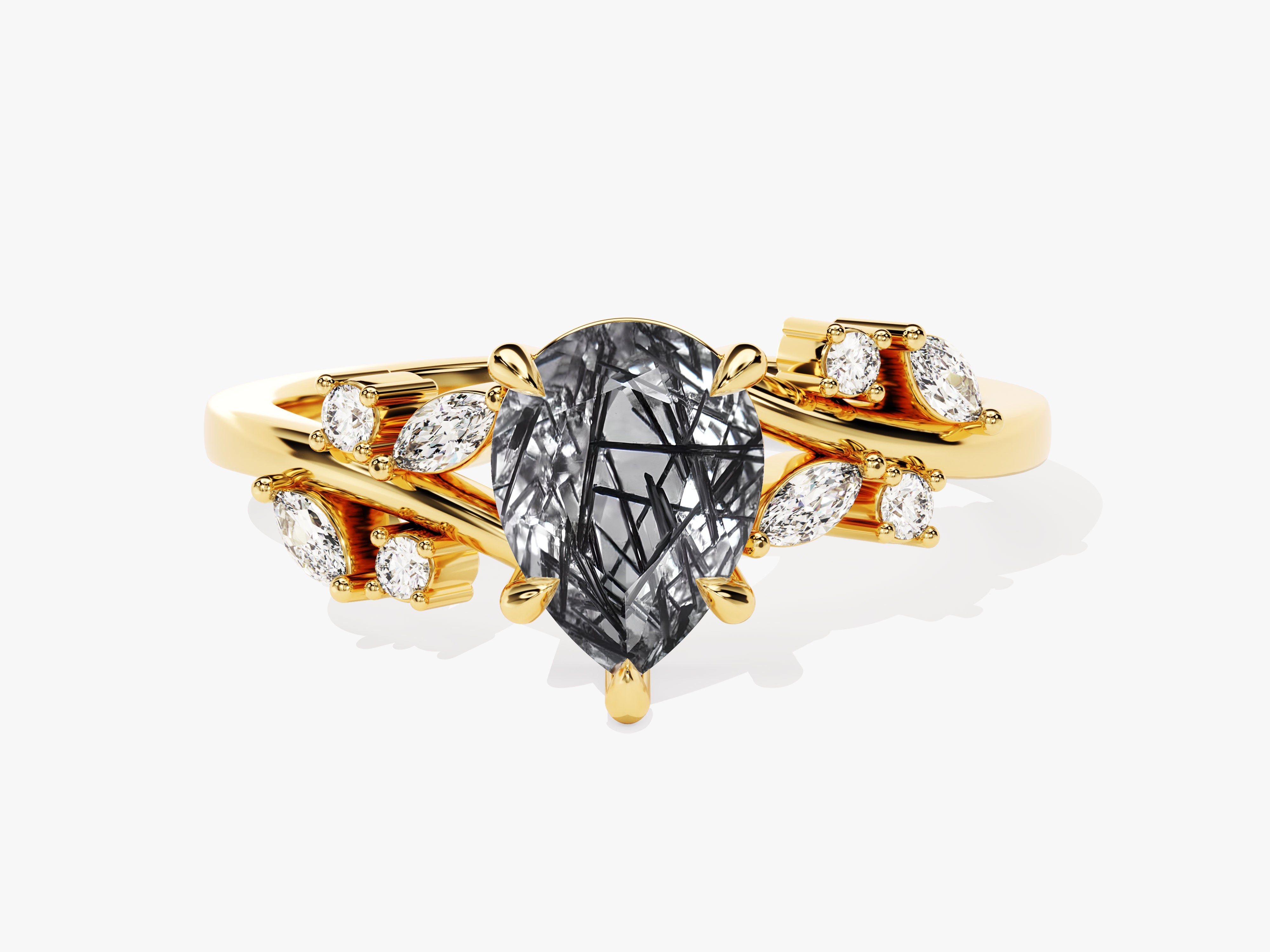 Gold ring with pear-cut rutilated quartz and diamonds