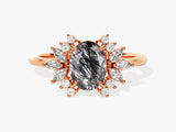 Rose gold ring with oval rutilated quartz and diamond halo