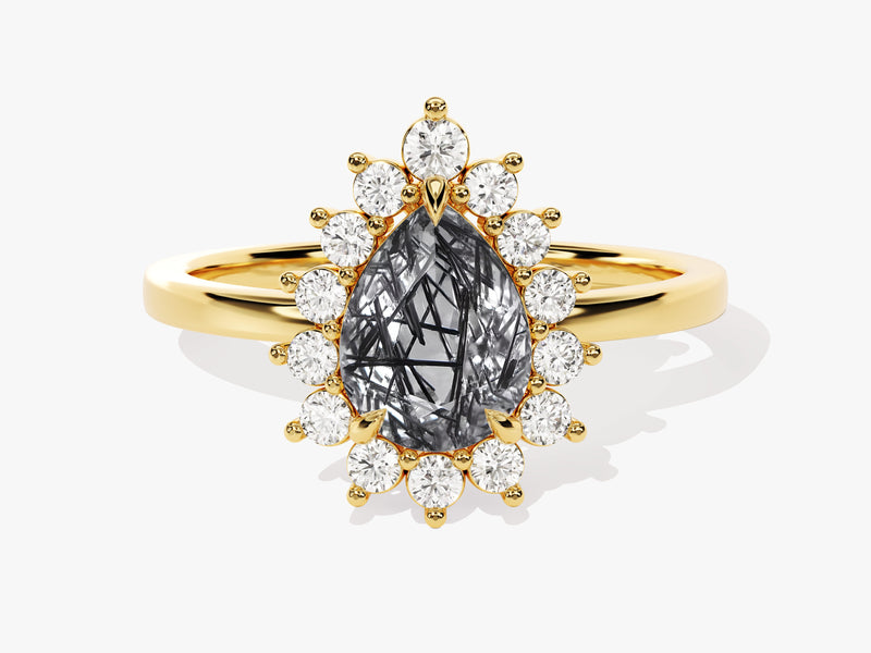 Gold ring with pear-cut rutilated quartz and diamond halo