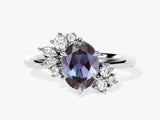 Oval alexandrite and diamond engagement ring