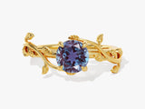 Gold alexandrite ring with vine leaf design