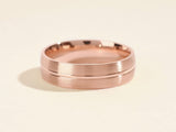 Rose gold brushed band ring with grooved detail, jewelry