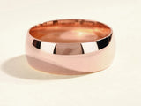 Rose gold wedding band jewelry, polished metal ring