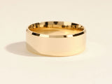 Gold wedding band, polished finish, classic jewelry design