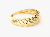 Gold twisted band ring jewelry product photography